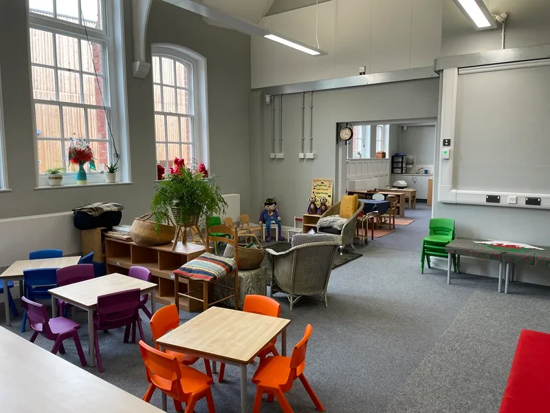 Bright 3 year old classroom with tables and play resources, Ysgol Feithrin Y Trallwng, Welshpool