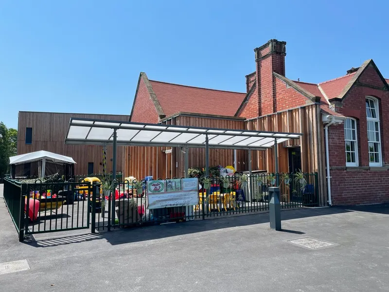 The front of Ysgol Feithrin Y Trallwng nursery and its outdoor canopy, Welshpool
